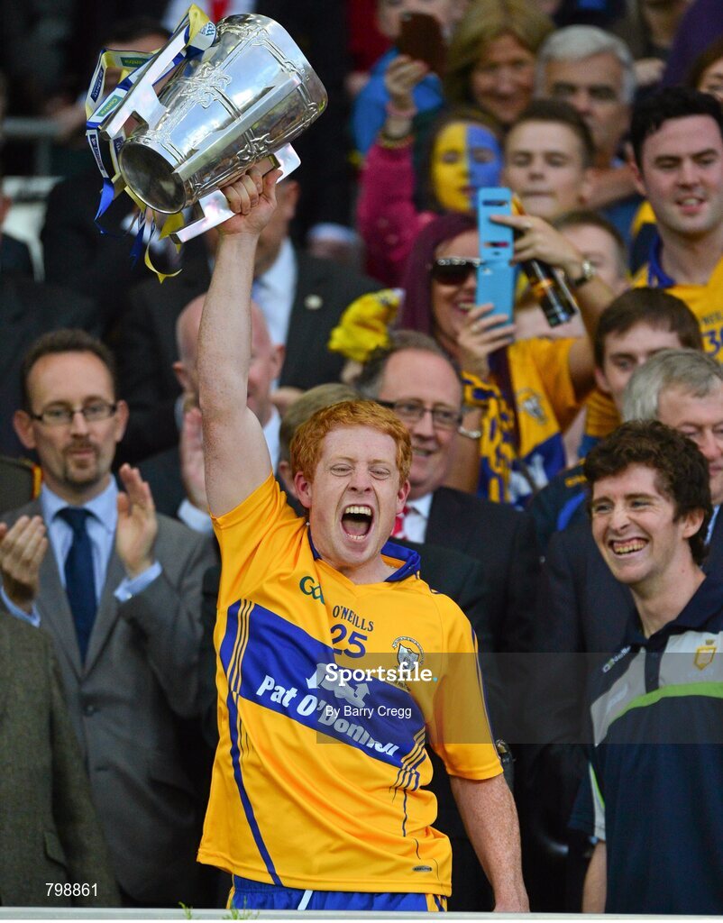 28 September 2013; Jonathan Clancy, Clare, lifts the Liam MacCarthy cup after the game. GAA Hurling All-Ireland Senior Championship Final Replay, Cork v Clare, Croke Park, Dublin. Picture credit: Barry Cregg / SPORTSFILE