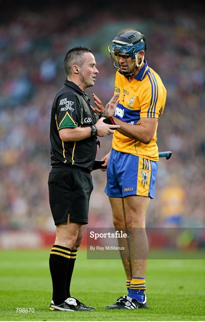 28 September 2013; Referee James McGrath speaks to Clare's Brendan Bugler during the game. GAA Hurling All-Ireland Senior Championship Final Replay, Cork v Clare, Croke Park, Dublin. Picture credit: Ray McManus / SPORTSFILE