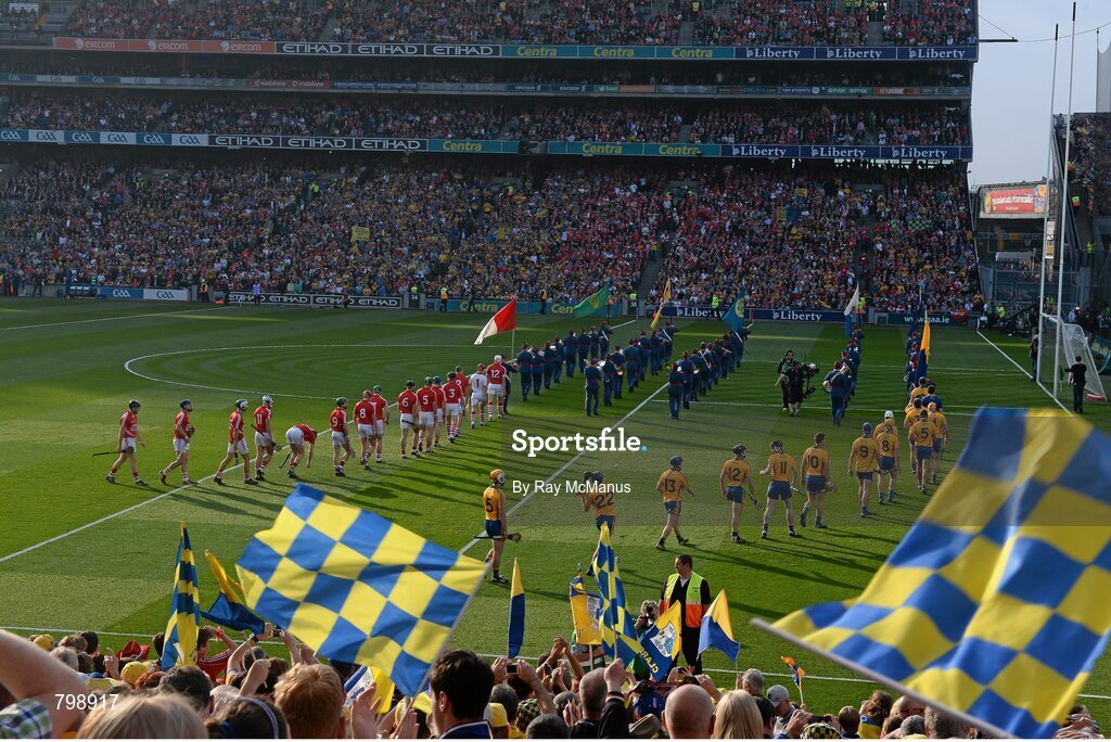 28 September 2013; The Cork and Clare players during the pre-match parade. GAA Hurling All-Ireland Senior Championship Final Replay, Cork v Clare, Croke Park, Dublin. Picture credit: Ray McManus / SPORTSFILE