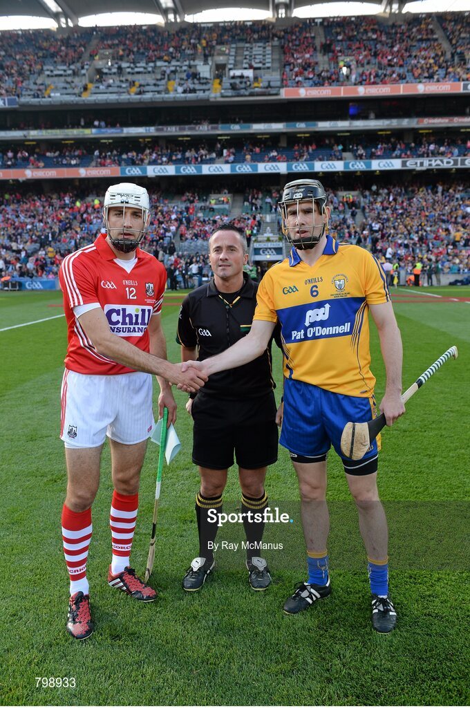 28 September 2013; Cork's Patrick Cronin, left, and Patrick Donnellan, Clare, right, shake hands in front of match referee James McGrath before the game. GAA Hurling All-Ireland Senior Championship Final Replay, Cork v Clare, Croke Park, Dublin. Picture credit: Ray McManus / SPORTSFILE