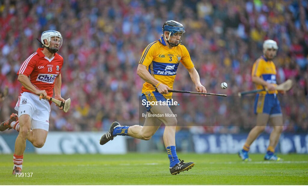 28 September 2013; David McInerney, Clare, in action against Luke O'Farrell, Cork. GAA Hurling All-Ireland Senior Championship Final Replay, Cork v Clare, Croke Park, Dublin. Picture credit: Brendan Moran / SPORTSFILE