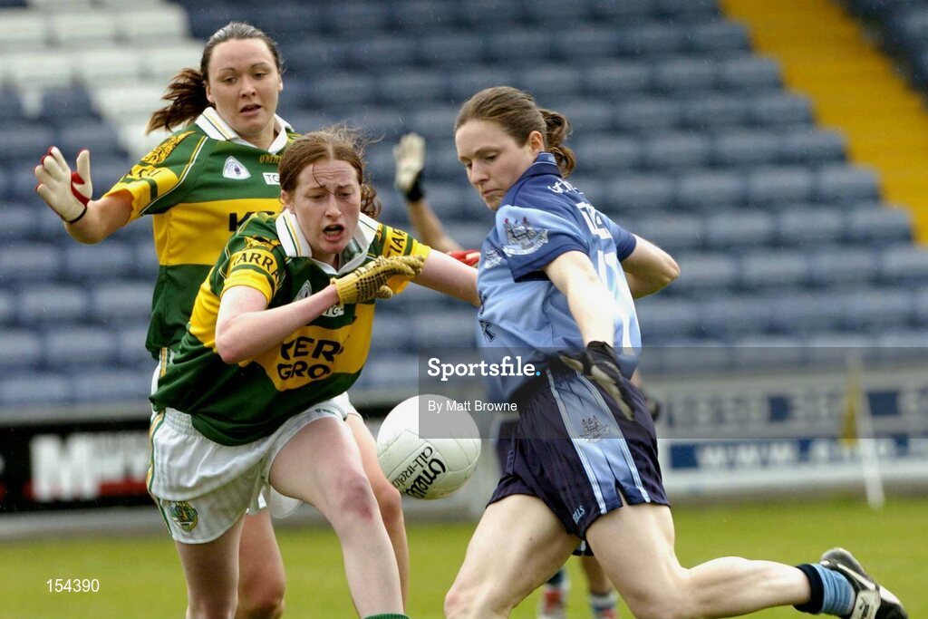 11 September 2004; Bernie Finlay, Dublin, gets her shot off to score a goal for her side despite the attentions of Katie Gleeson and Caroline Kelly, Kerry. Ladies Football Senior Championship Semi-Final, Dublin v Kerry, O'Moore Park, Portlaoise, Co. Laois. Picture credit; Matt Browne / SPORTSFILE