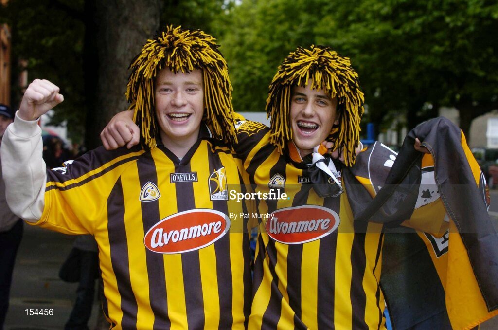 12 September 2004; Kilkenny fans Brian Dargan, left, and Michael Gaule show their support before the game. Guinness All-Ireland Senior Hurling Championship Final, Cork v Kilkenny, Croke Park, Dublin. Picture credit; Pat Murphy / SPORTSFILE *** Local Caption *** Any photograph taken by SPORTSFILE during, or in connection with, the 2004 Guinness All-Ireland Hurling Final which displays GAA logos or contains an image or part of an image of any GAA intellectual property, or, which contains images of a GAA player/players in their playing uniforms, may only be used for editorial and non-advertising purposes.  Use of photographs for advertising, as posters or for purchase separately is strictly prohibited unless prior written approval has been obtained from the Gaelic Athletic Association.
