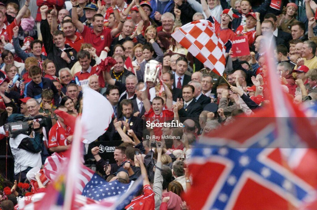 12 September 2004; The Cork Captain Ben O'Connor lifts the Liam MacCarthy Cup. Guinness All-Ireland Senior Hurling Championship Final, Cork v Kilkenny, Croke Park, Dublin. Picture credit; Ray McManus / SPORTSFILE *** Local Caption *** Any photograph taken by SPORTSFILE during, or in connection with, the 2004 Guinness All-Ireland Hurling Final which displays GAA logos or contains an image or part of an image of any GAA intellectual property, or, which contains images of a GAA player/players in their playing uniforms, may only be used for editorial and non-advertising purposes.  Use of photographs for advertising, as posters or for purchase separately is strictly prohibited unless prior written approval has been obtained from the Gaelic Athletic Association.