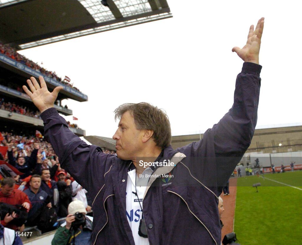 12 September 2004; Cork manager Donal O'Grady celebrates at the final whistle after victory over Kilkenny. Guinness All-Ireland Senior Hurling Championship Final, Cork v Kilkenny, Croke Park, Dublin. Picture credit; Brendan Moran / SPORTSFILE *** Local Caption *** Any photograph taken by SPORTSFILE during, or in connection with, the 2004 Guinness All-Ireland Hurling Final which displays GAA logos or contains an image or part of an image of any GAA intellectual property, or, which contains images of a GAA player/players in their playing uniforms, may only be used for editorial and non-advertising purposes.  Use of photographs for advertising, as posters or for purchase separately is strictly prohibited unless prior written approval has been obtained from the Gaelic Athletic Association.