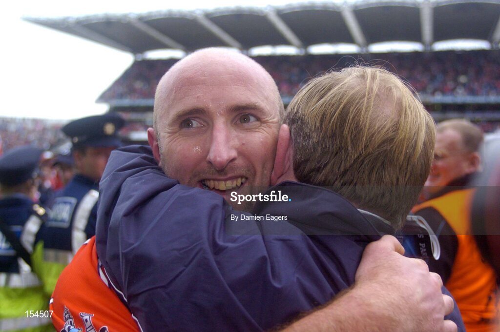 12 September 2004; Cork's Brian Corcoran after victory over Kilkenny. Guinness All-Ireland Senior Hurling Championship Final, Cork v Kilkenny, Croke Park, Dublin. Picture credit; Damien Eagers / SPORTSFILE *** Local Caption *** Any photograph taken by SPORTSFILE during, or in connection with, the 2004 Guinness All-Ireland Hurling Final which displays GAA logos or contains an image or part of an image of any GAA intellectual property, or, which contains images of a GAA player/players in their playing uniforms, may only be used for editorial and non-advertising purposes.  Use of photographs for advertising, as posters or for purchase separately is strictly prohibited unless prior written approval has been obtained from the Gaelic Athletic Association.