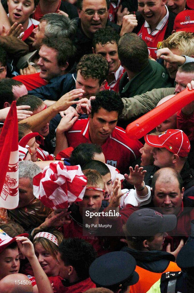 12 September 2004; Sean Og O'hAilpin, Cork, is congratulated after victory over Kilkenny. Guinness All-Ireland Senior Hurling Championship Final, Cork v Kilkenny, Croke Park, Dublin. Picture credit; Pat Murphy / SPORTSFILE *** Local Caption *** Any photograph taken by SPORTSFILE during, or in connection with, the 2004 Guinness All-Ireland Hurling Final which displays GAA logos or contains an image or part of an image of any GAA intellectual property, or, which contains images of a GAA player/players in their playing uniforms, may only be used for editorial and non-advertising purposes.  Use of photographs for advertising, as posters or for purchase separately is strictly prohibited unless prior written approval has been obtained from the Gaelic Athletic Association.