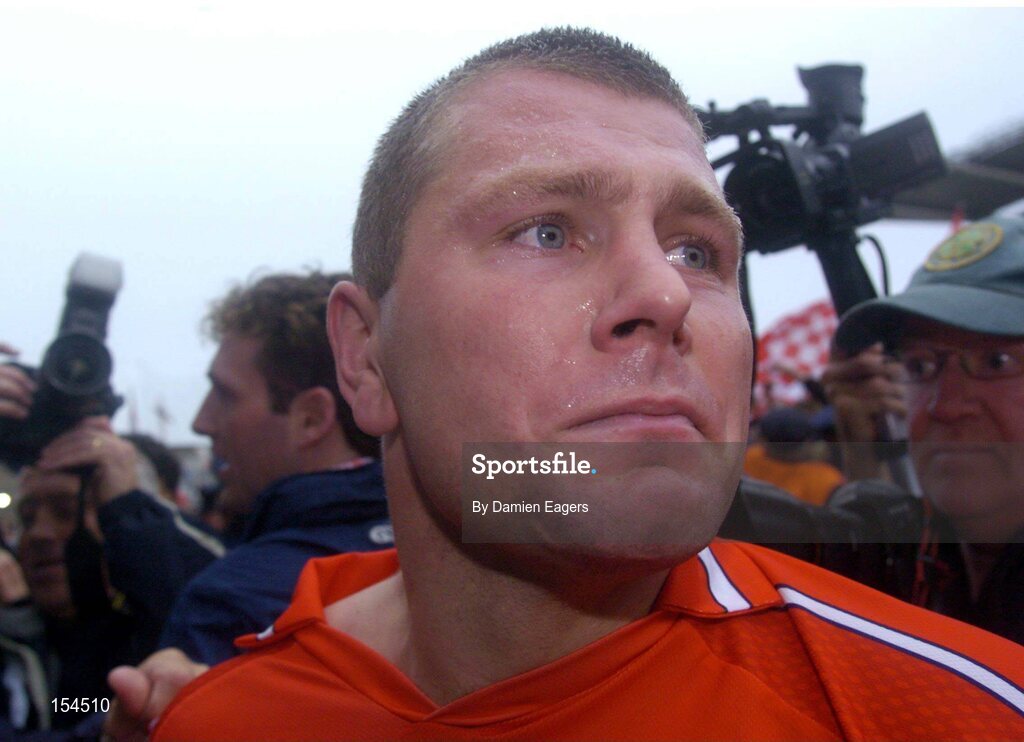 12 September 2004; Cork's Diarmuid O'Sullivan, after victory over Kilkenny. Guinness All-Ireland Senior Hurling Championship Final, Cork v Kilkenny, Croke Park, Dublin. Picture credit; Damien Eagers / SPORTSFILE *** Local Caption *** Any photograph taken by SPORTSFILE during, or in connection with, the 2004 Guinness All-Ireland Hurling Final which displays GAA logos or contains an image or part of an image of any GAA intellectual property, or, which contains images of a GAA player/players in their playing uniforms, may only be used for editorial and non-advertising purposes.  Use of photographs for advertising, as posters or for purchase separately is strictly prohibited unless prior written approval has been obtained from the Gaelic Athletic Association.