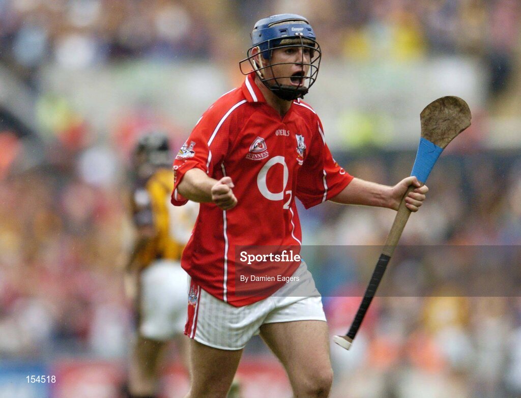 12 September 2004; Cork's Kieran Murphy celebrates a point during the match. Guinness All-Ireland Senior Hurling Championship Final, Cork v Kilkenny, Croke Park, Dublin. Picture credit; Damien Eagers / SPORTSFILE *** Local Caption *** Any photograph taken by SPORTSFILE during, or in connection with, the 2004 Guinness All-Ireland Hurling Final which displays GAA logos or contains an image or part of an image of any GAA intellectual property, or, which contains images of a GAA player/players in their playing uniforms, may only be used for editorial and non-advertising purposes.  Use of photographs for advertising, as posters or for purchase separately is strictly prohibited unless prior written approval has been obtained from the Gaelic Athletic Association. *** Local Caption *** Any photograph taken by SPORTSFILE during, or in connection with, the 2004 Guinness All-Ireland Hurling Final which displays GAA logos or contains an image or part of an image of any GAA intellectual property, or, which contains images of a GAA player/players in their playing uniforms, may only be used for editorial and non-advertising purposes.  Use of photographs for advertising, as posters or for purchase separately is strictly prohibited unless prior written approval has been obtained from the Gaelic Athletic Association.