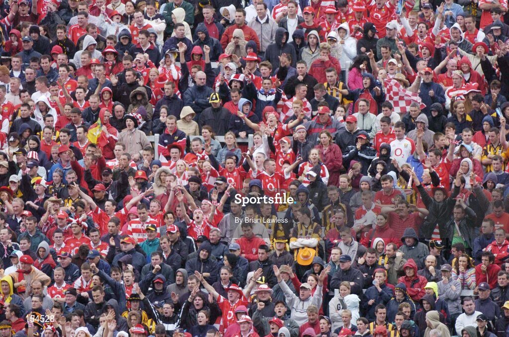 12 September 2004; Cork fans on Hill 16 during the match. Guinness All-Ireland Senior Hurling Championship Final, Cork v Kilkenny, Croke Park, Dublin. Picture credit; Brian Lawless / SPORTSFILE *** Local Caption *** Any photograph taken by SPORTSFILE during, or in connection with, the 2004 Guinness All-Ireland Hurling Final which displays GAA logos or contains an image or part of an image of any GAA intellectual property, or, which contains images of a GAA player/players in their playing uniforms, may only be used for editorial and non-advertising purposes.  Use of photographs for advertising, as posters or for purchase separately is strictly prohibited unless prior written approval has been obtained from the Gaelic Athletic Association.