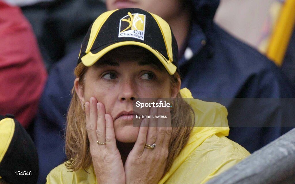 12 September 2004; A Kilkenny fan looks away during the dying moments of the game. Guinness All-Ireland Senior Hurling Championship Final, Cork v Kilkenny, Croke Park, Dublin. Picture credit; Brian Lawless / SPORTSFILE *** Local Caption *** Any photograph taken by SPORTSFILE during, or in connection with, the 2004 Guinness All-Ireland Hurling Final which displays GAA logos or contains an image or part of an image of any GAA intellectual property, or, which contains images of a GAA player/players in their playing uniforms, may only be used for editorial and non-advertising purposes.  Use of photographs for advertising, as posters or for purchase separately is strictly prohibited unless prior written approval has been obtained from the Gaelic Athletic Association.