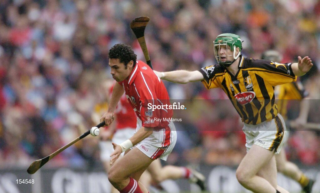 12 September 2004; Sean Og O hAilpin, Cork, in action against Henry Shefflin, Kilkenny. Guinness All-Ireland Senior Hurling Championship Final, Cork v Kilkenny, Croke Park, Dublin. Picture credit; Ray McManus / SPORTSFILE *** Local Caption *** Any photograph taken by SPORTSFILE during, or in connection with, the 2004 Guinness All-Ireland Hurling Final which displays GAA logos or contains an image or part of an image of any GAA intellectual property, or, which contains images of a GAA player/players in their playing uniforms, may only be used for editorial and non-advertising purposes.  Use of photographs for advertising, as posters or for purchase separately is strictly prohibited unless prior written approval has been obtained from the Gaelic Athletic Association.