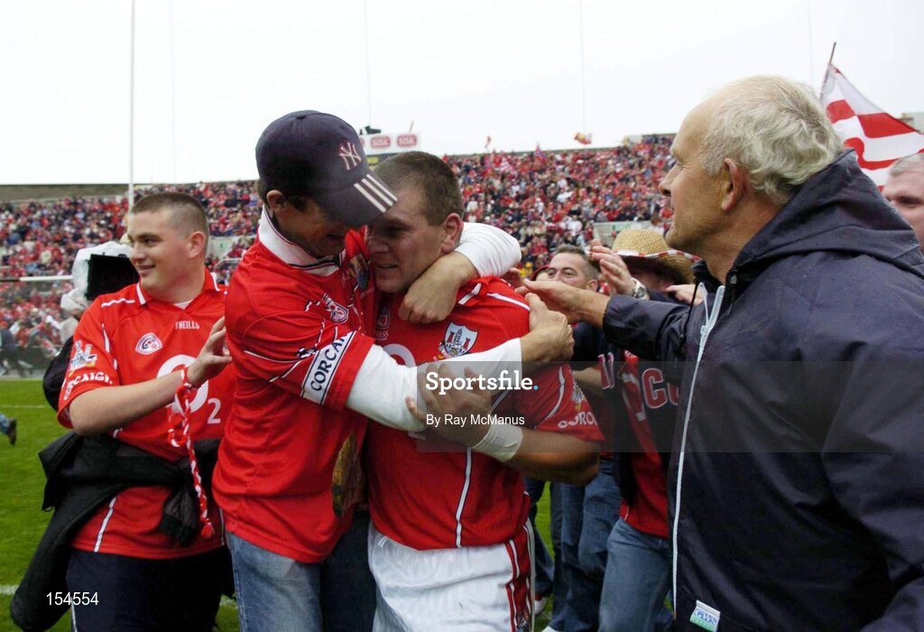 12 September 2004; Diarmuid O'Sullivan, Cork, is mobbed by supporters after the game. Guinness All-Ireland Senior Hurling Championship Final, Cork v Kilkenny, Croke Park, Dublin. Picture credit; Ray McManus / SPORTSFILE *** Local Caption *** Any photograph taken by SPORTSFILE during, or in connection with, the 2004 Guinness All-Ireland Hurling Final which displays GAA logos or contains an image or part of an image of any GAA intellectual property, or, which contains images of a GAA player/players in their playing uniforms, may only be used for editorial and non-advertising purposes.  Use of photographs for advertising, as posters or for purchase separately is strictly prohibited unless prior written approval has been obtained from the Gaelic Athletic Association.