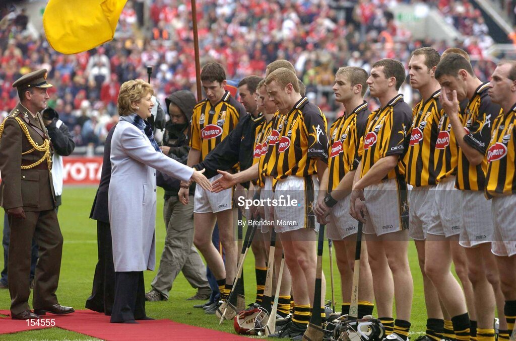 12 September 2004; President of Ireland Mary McAleese is introduced to the Kilkenny team before the game. Guinness All-Ireland Senior Hurling Championship Final, Cork v Kilkenny, Croke Park, Dublin. Picture credit; Brendan Moran / SPORTSFILE *** Local Caption *** Any photograph taken by SPORTSFILE during, or in connection with, the 2004 Guinness All-Ireland Hurling Final which displays GAA logos or contains an image or part of an image of any GAA intellectual property, or, which contains images of a GAA player/players in their playing uniforms, may only be used for editorial and non-advertising purposes.  Use of photographs for advertising, as posters or for purchase separately is strictly prohibited unless prior written approval has been obtained from the Gaelic Athletic Association.