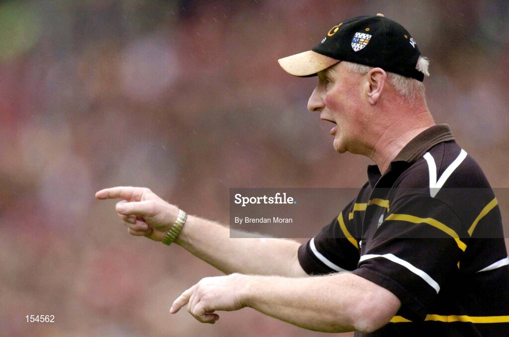12 September 2004; Kilkenny manager Brian Cody tells some of his players to switch positions during the game. Guinness All-Ireland Senior Hurling Championship Final, Cork v Kilkenny, Croke Park, Dublin. Picture credit; Brendan Moran / SPORTSFILE *** Local Caption *** Any photograph taken by SPORTSFILE during, or in connection with, the 2004 Guinness All-Ireland Hurling Final which displays GAA logos or contains an image or part of an image of any GAA intellectual property, or, which contains images of a GAA player/players in their playing uniforms, may only be used for editorial and non-advertising purposes.  Use of photographs for advertising, as posters or for purchase separately is strictly prohibited unless prior written approval has been obtained from the Gaelic Athletic Association.
