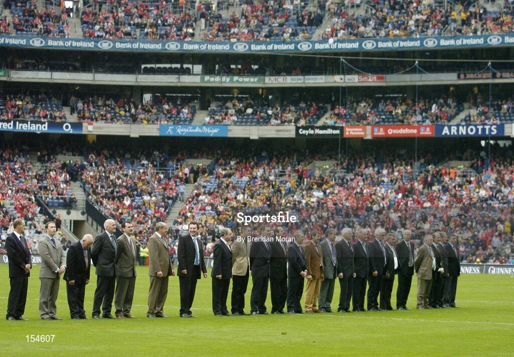 12 September 2004; Players and Representatives of the 1979 Kilkenny team prepare to be introduced to the crowd before the game. Guinness All-Ireland Senior Hurling Championship Final, Cork v Kilkenny, Croke Park, Dublin. Picture credit; Brendan Moran / SPORTSFILE *** Local Caption *** Any photograph taken by SPORTSFILE during, or in connection with, the 2004 Guinness All-Ireland Hurling Final which displays GAA logos or contains an image or part of an image of any GAA intellectual property, or, which contains images of a GAA player/players in their playing uniforms, may only be used for editorial and non-advertising purposes.  Use of photographs for advertising, as posters or for purchase separately is strictly prohibited unless prior written approval has been obtained from the Gaelic Athletic Association.