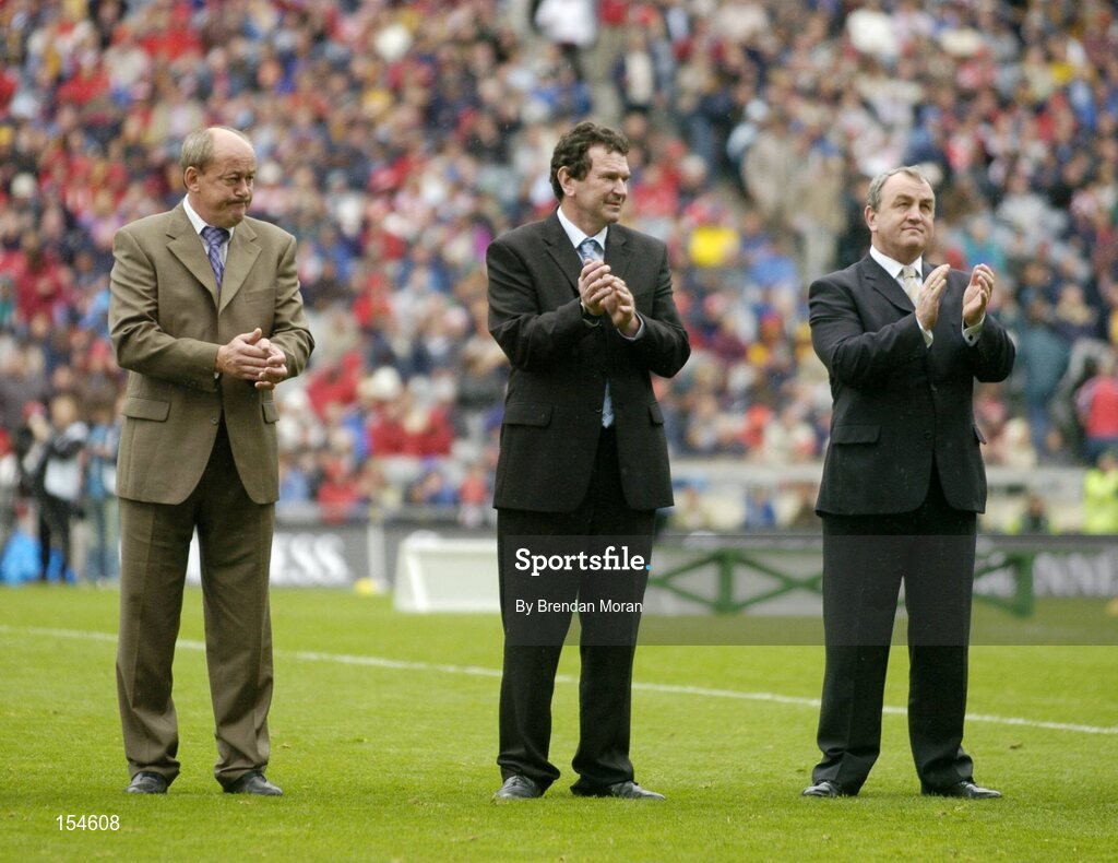 12 September 2004; Members of the 1979 Kilkenny team, from left, Richie Reid, Ger Henderson and Nickey Brennan, prepare to be introduced to the crowd before the game. Guinness All-Ireland Senior Hurling Championship Final, Cork v Kilkenny, Croke Park, Dublin. Picture credit; Brendan Moran / SPORTSFILE *** Local Caption *** Any photograph taken by SPORTSFILE during, or in connection with, the 2004 Guinness All-Ireland Hurling Final which displays GAA logos or contains an image or part of an image of any GAA intellectual property, or, which contains images of a GAA player/players in their playing uniforms, may only be used for editorial and non-advertising purposes.  Use of photographs for advertising, as posters or for purchase separately is strictly prohibited unless prior written approval has been obtained from the Gaelic Athletic Association.