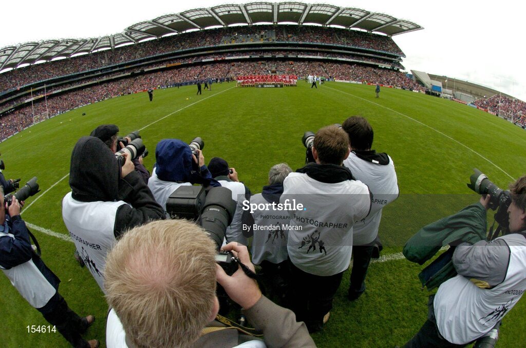 12 September 2004; The Cork team stand for the traditional team photograph before the game. Guinness All-Ireland Senior Hurling Championship Final, Cork v Kilkenny, Croke Park, Dublin. Picture credit; Brendan Moran / SPORTSFILE *** Local Caption *** Any photograph taken by SPORTSFILE during, or in connection with, the 2004 Guinness All-Ireland Hurling Final which displays GAA logos or contains an image or part of an image of any GAA intellectual property, or, which contains images of a GAA player/players in their playing uniforms, may only be used for editorial and non-advertising purposes.  Use of photographs for advertising, as posters or for purchase separately is strictly prohibited unless prior written approval has been obtained from the Gaelic Athletic Association.