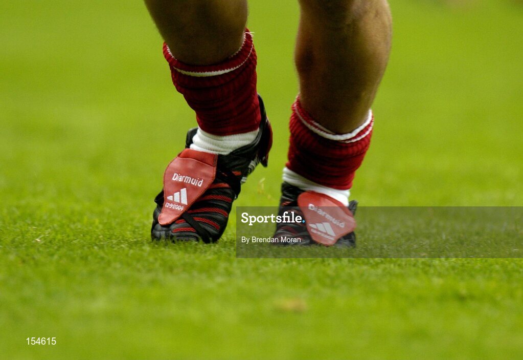 12 September 2004; The customised boots of Cork full-back Diarmuid O'Sullivan. Guinness All-Ireland Senior Hurling Championship Final, Cork v Kilkenny, Croke Park, Dublin. Picture credit; Brendan Moran / SPORTSFILE *** Local Caption *** Any photograph taken by SPORTSFILE during, or in connection with, the 2004 Guinness All-Ireland Hurling Final which displays GAA logos or contains an image or part of an image of any GAA intellectual property, or, which contains images of a GAA player/players in their playing uniforms, may only be used for editorial and non-advertising purposes.  Use of photographs for advertising, as posters or for purchase separately is strictly prohibited unless prior written approval has been obtained from the Gaelic Athletic Association.