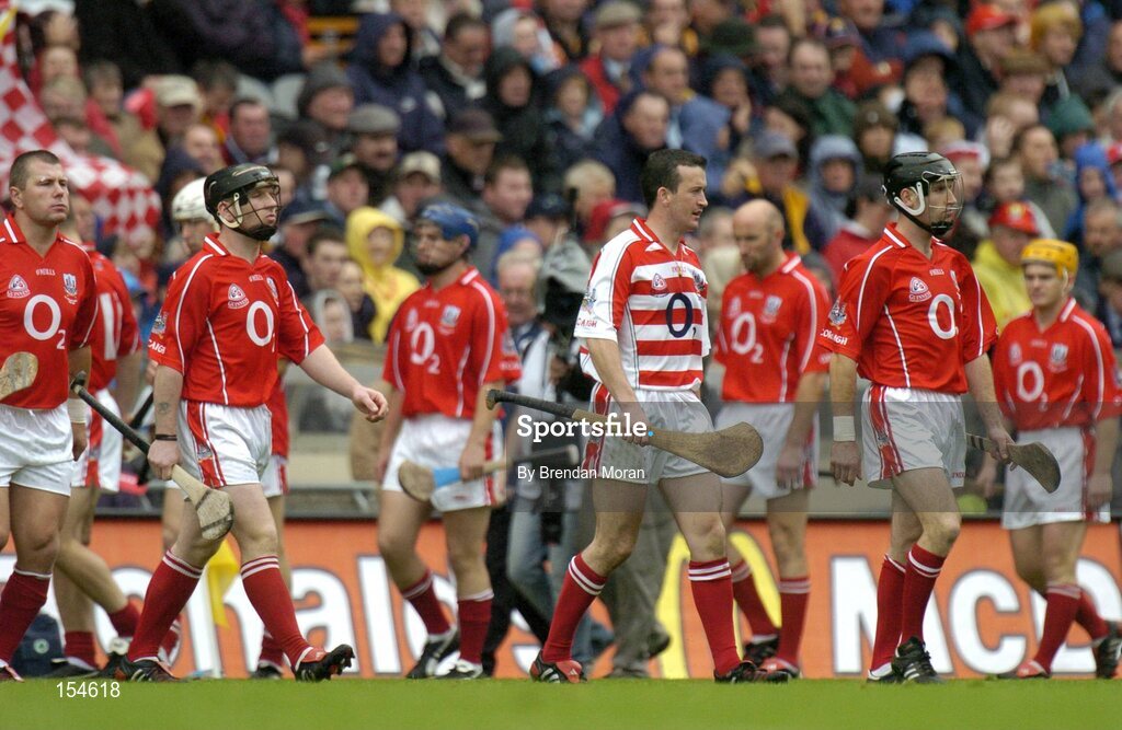 12 September 2004; Cork captain Ben O'Connor leads his side in the pre-match parade. Guinness All-Ireland Senior Hurling Championship Final, Cork v Kilkenny, Croke Park, Dublin. Picture credit; Brendan Moran / SPORTSFILE *** Local Caption *** Any photograph taken by SPORTSFILE during, or in connection with, the 2004 Guinness All-Ireland Hurling Final which displays GAA logos or contains an image or part of an image of any GAA intellectual property, or, which contains images of a GAA player/players in their playing uniforms, may only be used for editorial and non-advertising purposes.  Use of photographs for advertising, as posters or for purchase separately is strictly prohibited unless prior written approval has been obtained from the Gaelic Athletic Association.