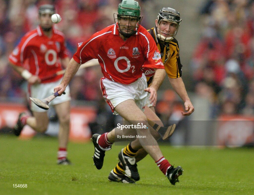 12 September 2004; Jerry O'Connor, Cork, in action against Eddie Brennan, Kilkenny. Guinness All-Ireland Senior Hurling Championship Final, Cork v Kilkenny, Croke Park, Dublin. Picture credit; Brendan Moran / SPORTSFILE *** Local Caption *** Any photograph taken by SPORTSFILE during, or in connection with, the 2004 Guinness All-Ireland Hurling Final which displays GAA logos or contains an image or part of an image of any GAA intellectual property, or, which contains images of a GAA player/players in their playing uniforms, may only be used for editorial and non-advertising purposes.  Use of photographs for advertising, as posters or for purchase separately is strictly prohibited unless prior written approval has been obtained from the Gaelic Athletic Association.