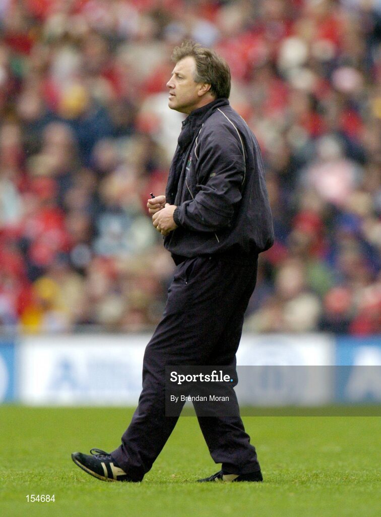 12 September 2004; Donal O'Grady, Cork manager. Guinness All-Ireland Senior Hurling Championship Final, Cork v Kilkenny, Croke Park, Dublin. Picture credit; Brendan Moran / SPORTSFILE *** Local Caption *** Any photograph taken by SPORTSFILE during, or in connection with, the 2004 Guinness All-Ireland Hurling Final which displays GAA logos or contains an image or part of an image of any GAA intellectual property, or, which contains images of a GAA player/players in their playing uniforms, may only be used for editorial and non-advertising purposes.  Use of photographs for advertising, as posters or for purchase separately is strictly prohibited unless prior written approval has been obtained from the Gaelic Athletic Association.