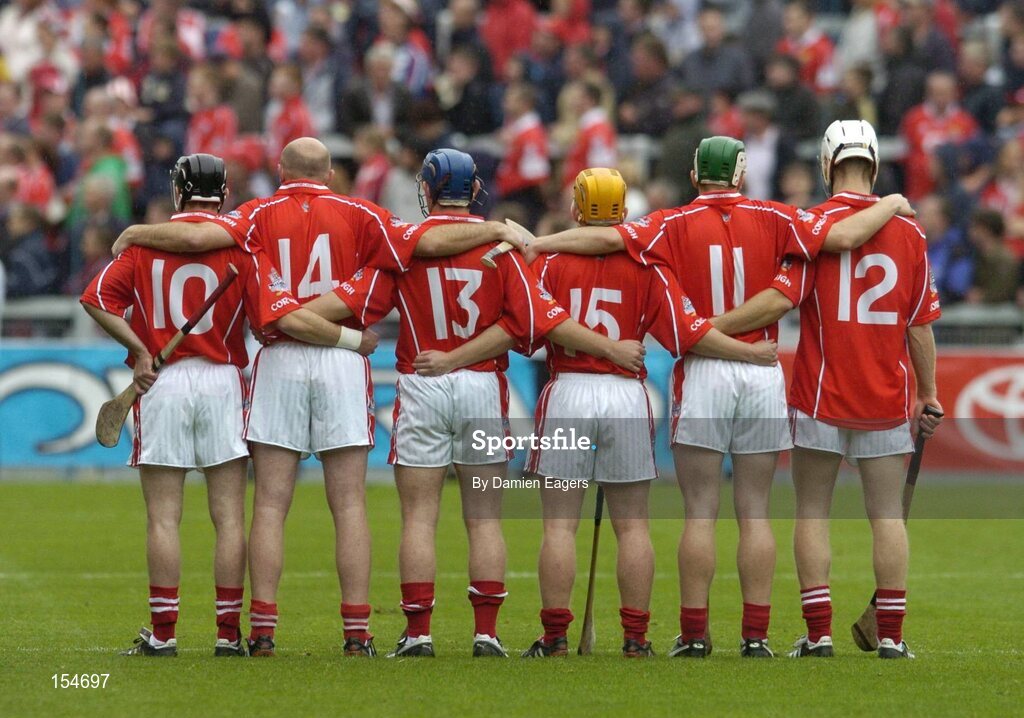 12 September 2004; Cork players, l to r, Ben O'Connor, Brian Corcoran, Kieran Murphy, Joe Deane, Niall McCarthy and Timmy McCarthy stand for a minutes silence in memory of the victims of the Beslan tragedy and Richie Mullally, father of Kilkenny panellists Eddie and Richard who past away Saturday night. Guinness All-Ireland Senior Hurling Championship Final, Cork v Kilkenny, Croke Park, Dublin. Picture credit; Damien Eagers / SPORTSFILE *** Local Caption *** Any photograph taken by SPORTSFILE during, or in connection with, the 2004 Guinness All-Ireland Hurling Final which displays GAA logos or contains an image or part of an image of any GAA intellectual property, or, which contains images of a GAA player/players in their playing uniforms, may only be used for editorial and non-advertising purposes.  Use of photographs for advertising, as posters or for purchase separately is strictly prohibited unless prior written approval has been obtained from the Gaelic Athletic Association.
