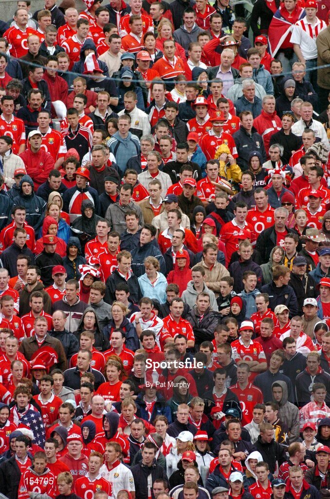 12 September 2004; Cork fans pictured before the game. Guinness All-Ireland Senior Hurling Championship Final, Cork v Kilkenny, Croke Park, Dublin. Picture credit; Pat Murphy / SPORTSFILE *** Local Caption *** Any photograph taken by SPORTSFILE during, or in connection with, the 2004 Guinness All-Ireland Hurling Final which displays GAA logos or contains an image or part of an image of any GAA intellectual property, or, which contains images of a GAA player/players in their playing uniforms, may only be used for editorial and non-advertising purposes.  Use of photographs for advertising, as posters or for purchase separately is strictly prohibited unless prior written approval has been obtained from the Gaelic Athletic Association.