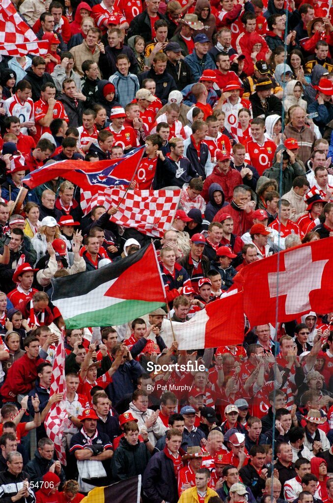 12 September 2004; Cork supporters pictured during the game. Guinness All-Ireland Senior Hurling Championship Final, Cork v Kilkenny, Croke Park, Dublin. Picture credit; Pat Murphy / SPORTSFILE *** Local Caption *** Any photograph taken by SPORTSFILE during, or in connection with, the 2004 Guinness All-Ireland Hurling Final which displays GAA logos or contains an image or part of an image of any GAA intellectual property, or, which contains images of a GAA player/players in their playing uniforms, may only be used for editorial and non-advertising purposes.  Use of photographs for advertising, as posters or for purchase separately is strictly prohibited unless prior written approval has been obtained from the Gaelic Athletic Association.