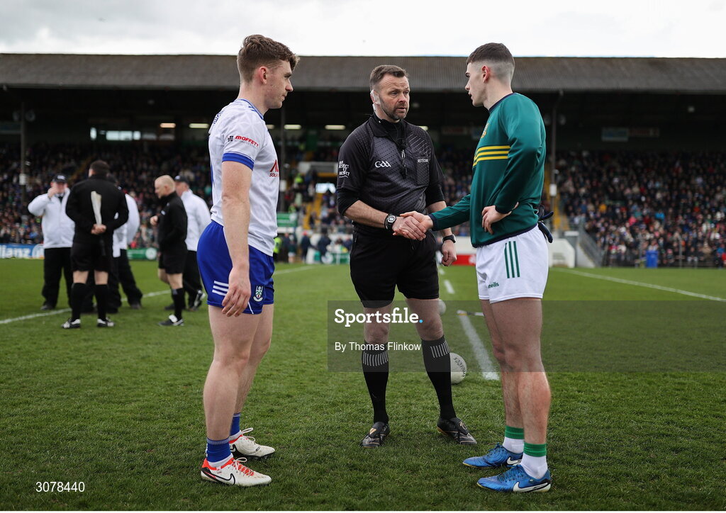 16 March 2025; Mícheál Bannigan of Monaghan with referee Anthony Nolan and Eoghan Frayne of Meath before the Allianz Football League Division 2 match between Meath and Monaghan at Páirc Tailteann in Navan, Meath. Photo by Thomas Flinkow/Sportsfile