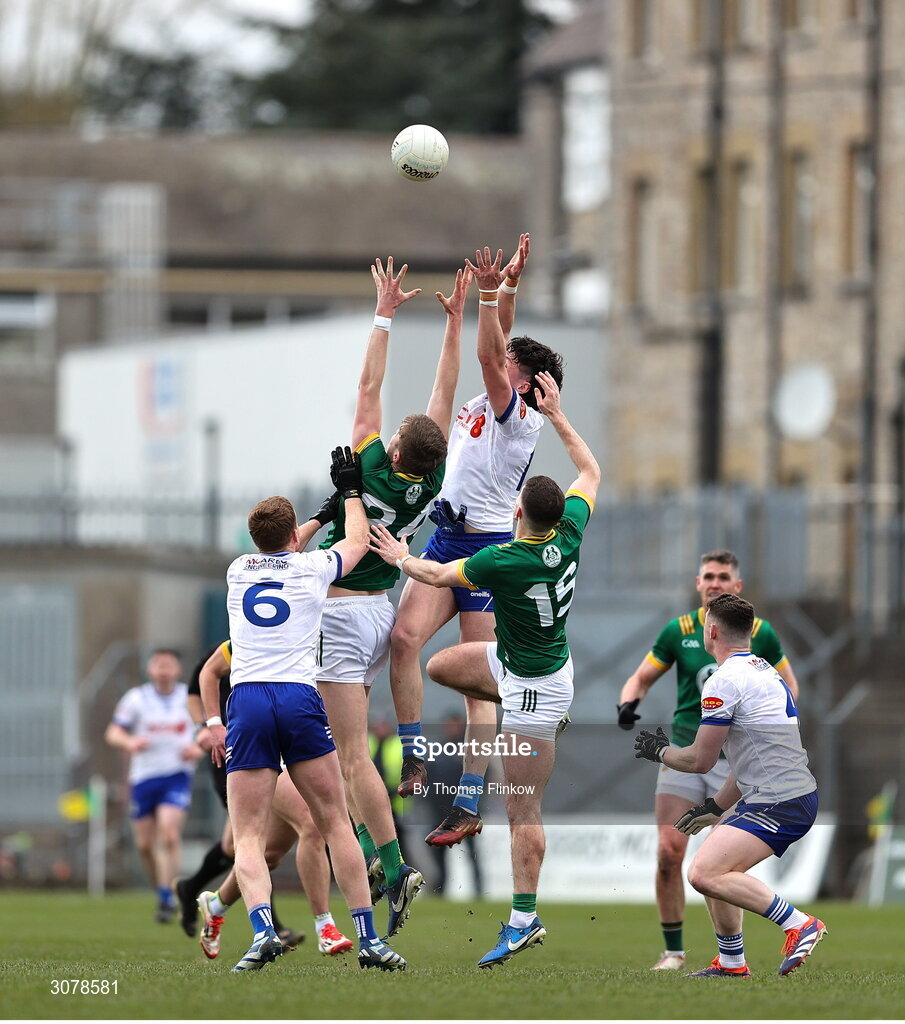 16 March 2025; Gary Mohan of Monaghan in action against Meath players Charlie O'Connor, left, and Eoghan Frayne during the Allianz Football League Division 2 match between Meath and Monaghan at Páirc Tailteann in Navan, Meath. Photo by Thomas Flinkow/Sportsfile