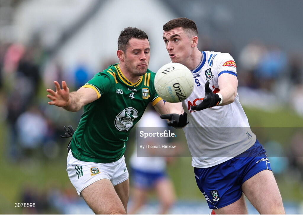 16 March 2025; Mícheál McCarville of Monaghan in action against Donal Keogan of Meath during the Allianz Football League Division 2 match between Meath and Monaghan at Páirc Tailteann in Navan, Meath. Photo by Thomas Flinkow/Sportsfile
