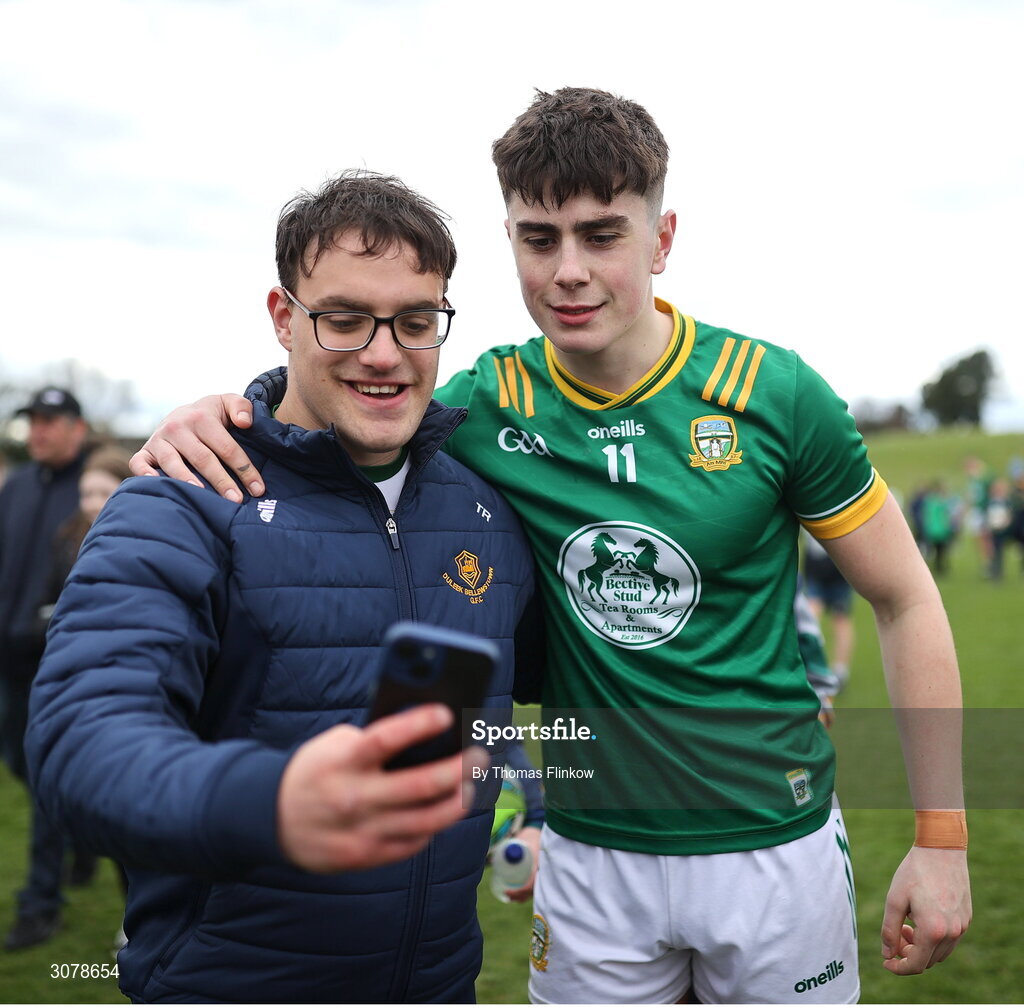 16 March 2025; Jack Kinlough of Meath takes a photo with a supporter after the Allianz Football League Division 2 match between Meath and Monaghan at Páirc Tailteann in Navan, Meath. Photo by Thomas Flinkow/Sportsfile