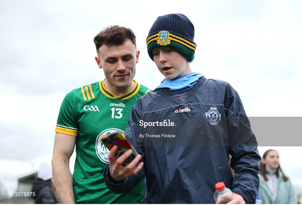 16 March 2025; Jordan Morris of Meath has his photo taken with a supporter after the Allianz Football League Division 2 match between Meath and Monaghan at Páirc Tailteann in Navan, Meath. Photo by Thomas Flinkow/Sportsfile