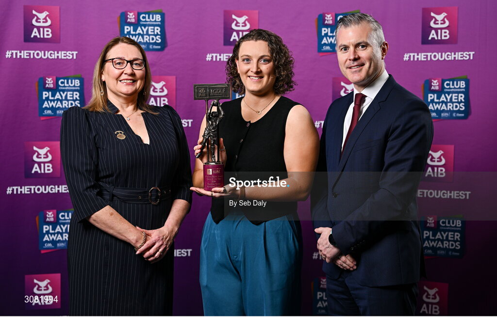 21 March 2025; Kilmacud Crokes ladies footballer Dearbhla Gower is presented her 2024 Ladies Gaelic Football Team of the Year award by President of the Ladies Gaelic Football Association, Trina Murray and Chief Marketing Officer of AIB, Mark Doyle during the AIB Club Player Awards at Croke Park in Dublin. The AIB Club Player Awards celebrated the best players from club Football, Hurling, Camogie, and LGFA in a single ceremony for the first time, recognising their outstanding achievements on the field throughout the season. Photo by Seb Daly/Sportsfile