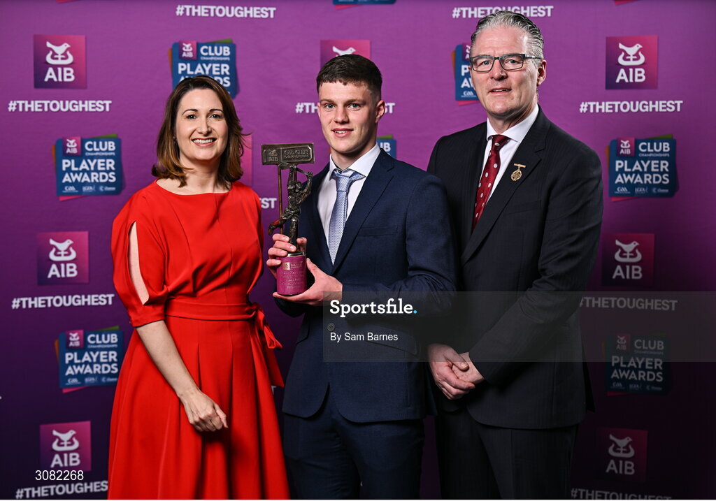21 March 2025; Sarsfields hurler Cathal McCarthy is presented with his 2024/25 Hurling Team of the Year award by Uachtarán Cumann Lúthchleas Gael, Jarlath Burns and Chief Customer Officer of AIB, Orlaith Ryan during the AIB Club Player Awards at Croke Park in Dublin. The AIB Club Player Awards celebrated the best players from club Football, Hurling, Camogie, and LGFA in a single ceremony for the first time, recognising their outstanding achievements on the field throughout the season. Photo by Sam Barnes/Sportsfile