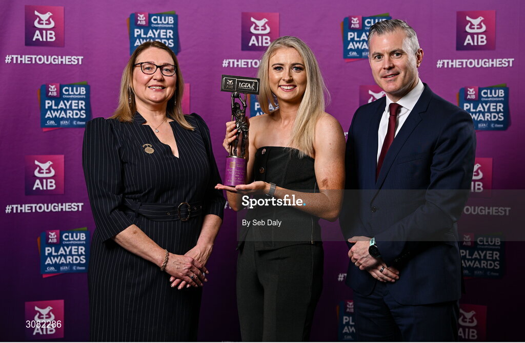 21 March 2025; Kilkerrin-Clonberne ladies footballer Louise Ward is presented her 2024 Ladies Gaelic Football Team of the Year award by President of the Ladies Gaelic Football Association, Trina Murray and Chief Marketing Officer of AIB, Mark Doyle during the AIB Club Player Awards at Croke Park in Dublin. The AIB Club Player Awards celebrated the best players from club Football, Hurling, Camogie, and LGFA in a single ceremony for the first time, recognising their outstanding achievements on the field throughout the season. Photo by Seb Daly/Sportsfile