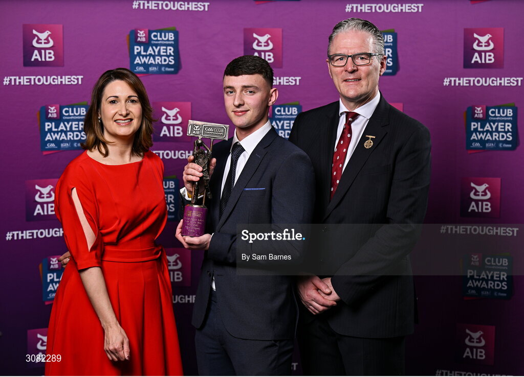 21 March 2025; Cuala footballer David O'Dowd is presented with his 2024/25 Football Team of the Year award by Uachtarán Cumann Lúthchleas Gael, Jarlath Burns and Chief Customer Officer of AIB, Orlaith Ryan, during the AIB Club Player Awards at Croke Park in Dublin. The AIB Club Player Awards celebrated the best players from club Football, Hurling, Camogie, and LGFA in a single ceremony for the first time, recognising their outstanding achievements on the field throughout the season. Photo by Sam Barnes/Sportsfile