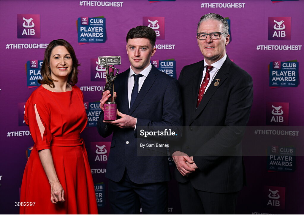 21 March 2025; Sarsfields hurler Jack O'Connor is presented with his 2024/25 Hurling Team of the Year award by Uachtarán Cumann Lúthchleas Gael, Jarlath Burns and Chief Customer Officer of AIB, Orlaith Ryan during the AIB Club Player Awards at Croke Park in Dublin. The AIB Club Player Awards celebrated the best players from club Football, Hurling, Camogie, and LGFA in a single ceremony for the first time, recognising their outstanding achievements on the field throughout the season. Photo by Sam Barnes/Sportsfile
