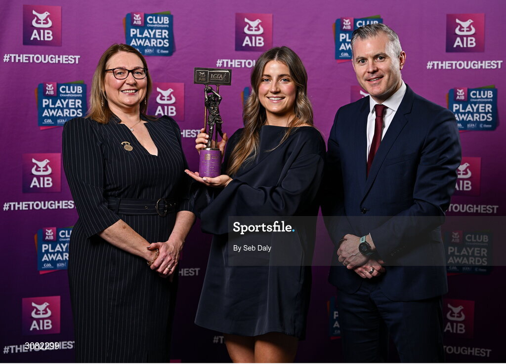 21 March 2025; Kilmacud Crokes ladies footballer Aoife Kane is presented her 2024 Ladies Gaelic Football Team of the Year award by President of the Ladies Gaelic Football Association, Trina Murray and Chief Marketing Officer of AIB, Mark Doyle during the AIB Club Player Awards at Croke Park in Dublin. The AIB Club Player Awards celebrated the best players from club Football, Hurling, Camogie, and LGFA in a single ceremony for the first time, recognising their outstanding achievements on the field throughout the season. Photo by Seb Daly/Sportsfile