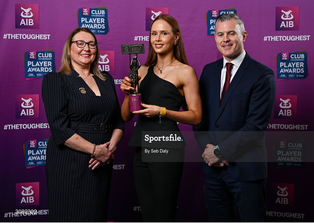 21 March 2025; Kilkerrin-Clonberne ladies footballer Olivia Divilly is presented her 2024 Ladies Gaelic Football Team of the Year award by President of the Ladies Gaelic Football Association, Trina Murray and Chief Marketing Officer of AIB, Mark Doyle during the AIB Club Player Awards at Croke Park in Dublin. The AIB Club Player Awards celebrated the best players from club Football, Hurling, Camogie, and LGFA in a single ceremony for the first time, recognising their outstanding achievements on the field throughout the season. Photo by Seb Daly/Sportsfile