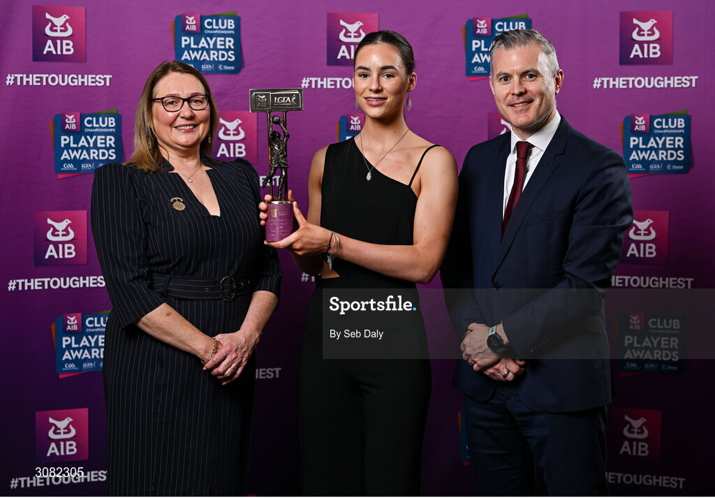 21 March 2025; Kilkerrin-Clonberne ladies footballer Aisling Madden is presented her 2024 Ladies Gaelic Football Team of the Year award by President of the Ladies Gaelic Football Association, Trina Murray and Chief Marketing Officer of AIB, Mark Doyle during the AIB Club Player Awards at Croke Park in Dublin. The AIB Club Player Awards celebrated the best players from club Football, Hurling, Camogie, and LGFA in a single ceremony for the first time, recognising their outstanding achievements on the field throughout the season. Photo by Seb Daly/Sportsfile