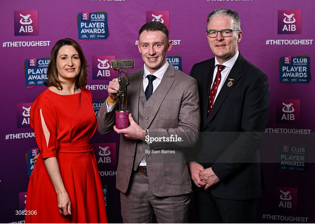 21 March 2025; Na Fianna hurler Colin Currie is presented with his 2024/25 Hurling Team of the Year award by Uachtarán Cumann Lúthchleas Gael, Jarlath Burns and Chief Customer Officer of AIB, Orlaith Ryan during the AIB Club Player Awards at Croke Park in Dublin. The AIB Club Player Awards celebrated the best players from club Football, Hurling, Camogie, and LGFA in a single ceremony for the first time, recognising their outstanding achievements on the field throughout the season. Photo by Sam Barnes/Sportsfile
