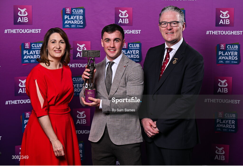 21 March 2025; Errigal Ciaran footballer Darragh Canavan is presented with his 2024/25 Football Team of the Year award by Uachtarán Cumann Lúthchleas Gael, Jarlath Burns and Chief Customer Officer of AIB, Orlaith Ryan, during the AIB Club Player Awards at Croke Park in Dublin. The AIB Club Player Awards celebrated the best players from club Football, Hurling, Camogie, and LGFA in a single ceremony for the first time, recognising their outstanding achievements on the field throughout the season. Photo by Sam Barnes/Sportsfile