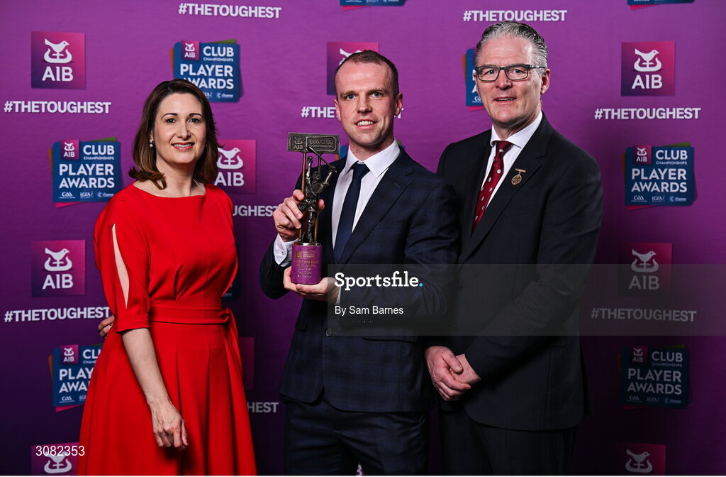 21 March 2025; Na Fianna hurler Paul O'Dea is presented with his 2024/25 Hurling Team of the Year award by Uachtarán Cumann Lúthchleas Gael, Jarlath Burns and Chief Customer Officer of AIB, Orlaith Ryan during the AIB Club Player Awards at Croke Park in Dublin. The AIB Club Player Awards celebrated the best players from club Football, Hurling, Camogie, and LGFA in a single ceremony for the first time, recognising their outstanding achievements on the field throughout the season. Photo by Sam Barnes/Sportsfile