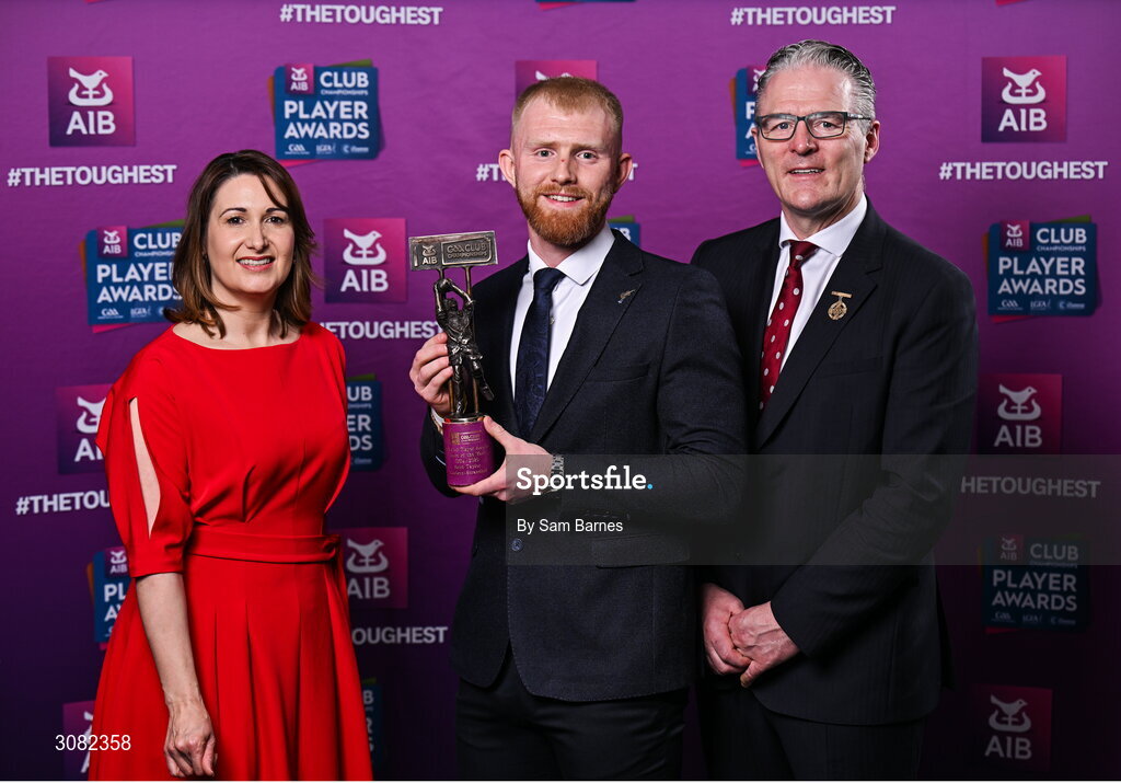 21 March 2025; Coolera-Strandhill footballer Seán Taylor is presented with his 2024/25 Football Team of the Year award by Uachtarán Cumann Lúthchleas Gael, Jarlath Burns and Chief Customer Officer of AIB, Orlaith Ryan, during the AIB Club Player Awards at Croke Park in Dublin. The AIB Club Player Awards celebrated the best players from club Football, Hurling, Camogie, and LGFA in a single ceremony for the first time, recognising their outstanding achievements on the field throughout the season. Photo by Sam Barnes/Sportsfile