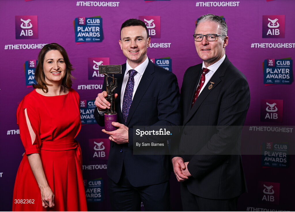 21 March 2025; Na Fianna hurler Liam Rushe is presented with his 2024/25 Hurling Team of the Year award by Uachtarán Cumann Lúthchleas Gael, Jarlath Burns and Chief Customer Officer of AIB, Orlaith Ryan during the AIB Club Player Awards at Croke Park in Dublin. The AIB Club Player Awards celebrated the best players from club Football, Hurling, Camogie, and LGFA in a single ceremony for the first time, recognising their outstanding achievements on the field throughout the season. Photo by Sam Barnes/Sportsfile