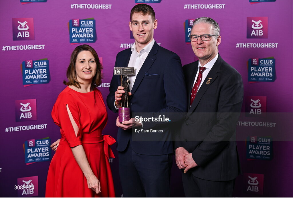 21 March 2025; Cuala footballer Peadar Ó Cofaigh Byrne is presented with his 2024/25 Football Team of the Year award by Uachtarán Cumann Lúthchleas Gael, Jarlath Burns and Chief Customer Officer of AIB, Orlaith Ryan, during the AIB Club Player Awards at Croke Park in Dublin. The AIB Club Player Awards celebrated the best players from club Football, Hurling, Camogie, and LGFA in a single ceremony for the first time, recognising their outstanding achievements on the field throughout the season. Photo by Sam Barnes/Sportsfile