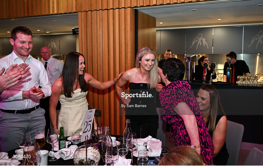 21 March 2025; 2024 AIB Ladies Gaelic Football Club Championship Player of the Year, Louise Ward of Kilkerrin-Clonberne, centre, is congratulated by friends and family as she makes her way to the stage to collect her award during the AIB Club Player Awards at Croke Park in Dublin. The AIB Club Player Awards celebrated the best players from club Football, Hurling, Camogie, and LGFA in a single ceremony for the first time, recognising their outstanding achievements on the field throughout the season. Photo by Sam Barnes/Sportsfile
