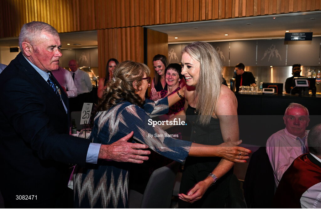 21 March 2025; 2024 AIB Ladies Gaelic Football Club Championship Player of the Year, Louise Ward of Kilkerrin-Clonberne, centre, is congratulated by friends and family as she makes her way to the stage to collect her award during the AIB Club Player Awards at Croke Park in Dublin. The AIB Club Player Awards celebrated the best players from club Football, Hurling, Camogie, and LGFA in a single ceremony for the first time, recognising their outstanding achievements on the field throughout the season. Photo by Sam Barnes/Sportsfile